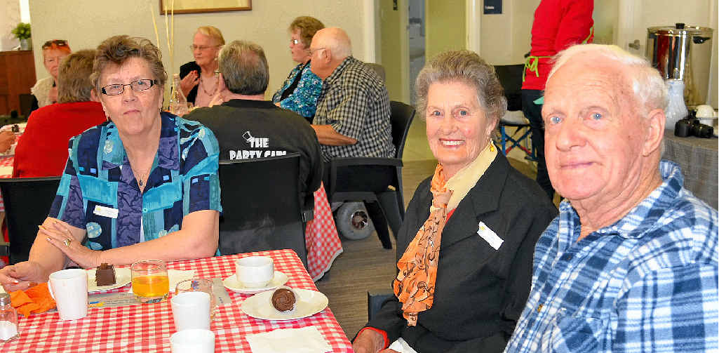 Rosemary Rasanen and Junette and Sidney Paskins have some dessert with their neighbours. Rosemary Rasanen and Junette and Sidney Paskins have some dessert with their neighbours.